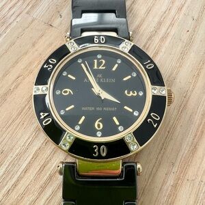 Anne Klein ladies gold tone black ceramic dress watch NEW BATTERY